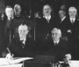President Coolidge signs the Kellogg-Briand Pact