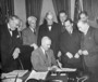 Truman Signs the Economic Assistance Act